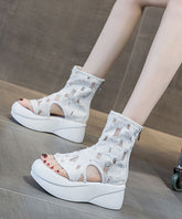 Botas vaqueras negras únicas con plataforma y chanclas huecas